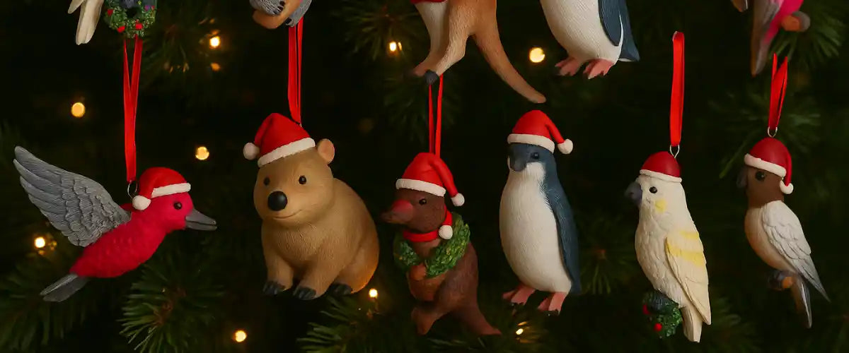 Animal Christmas ornaments featuring festive animal designs for decorating Christmas trees, wreaths, garlands and seasonal displays.