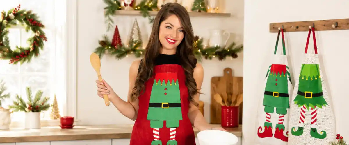 Christmas Aprons and Tea Towels featuring festive holiday prints and seasonal designs for Christmas cooking, baking and kitchen décor.