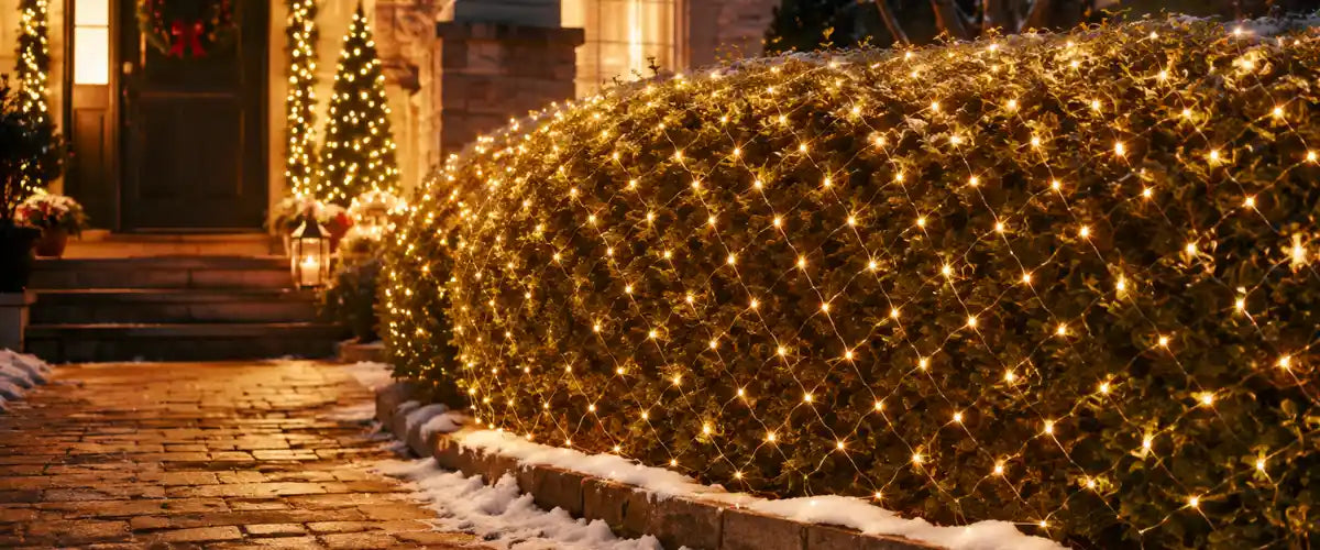 Christmas LED net lights featuring bright, evenly spaced illumination for bushes, hedges, fences and festive outdoor holiday displays.