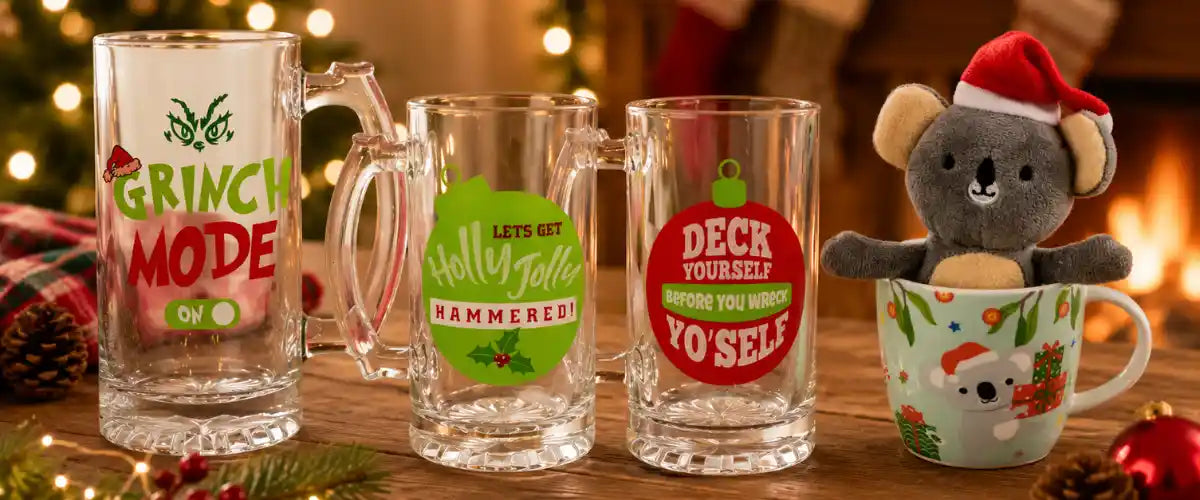 Christmas Mugs Collection featuring festive holiday mugs in seasonal colours and cheerful Christmas designs, perfect for hot drinks and gifting.