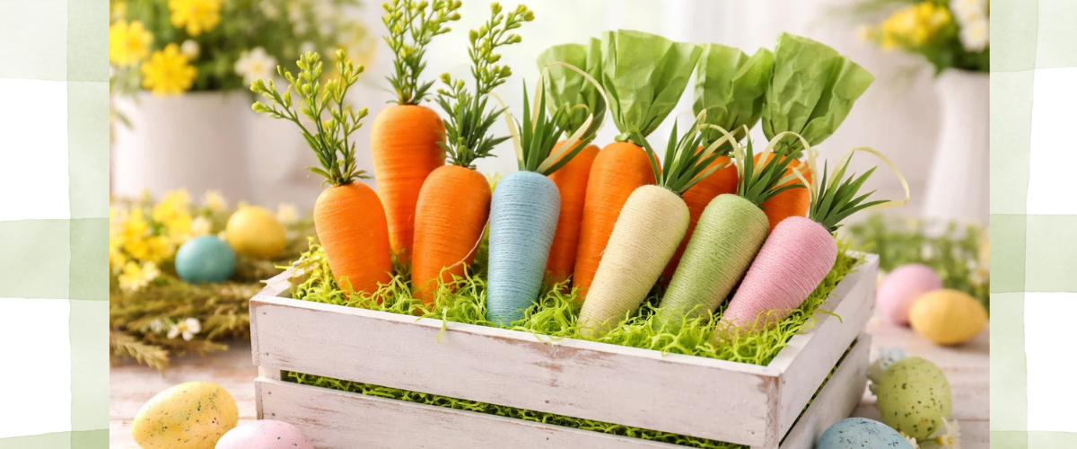 Assorted Easter carrot decorations including flocked carrots, foam carrots and glitter carrot picks for crafts, hat parades and Easter displays.