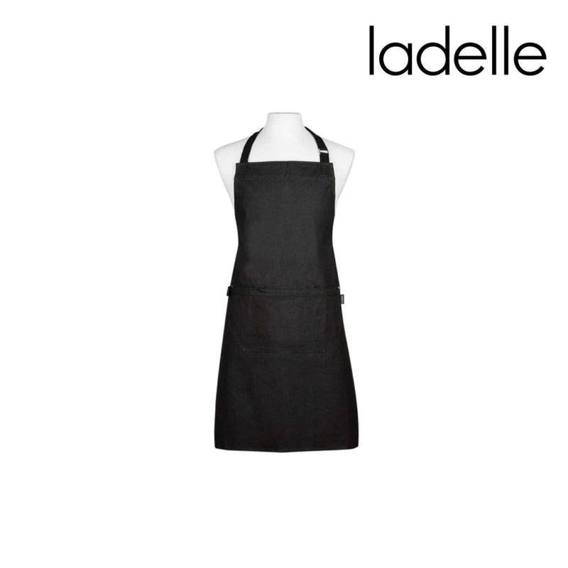 Textured black apron with adjustable straps