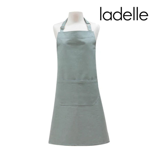 Textured light blue apron with pockets