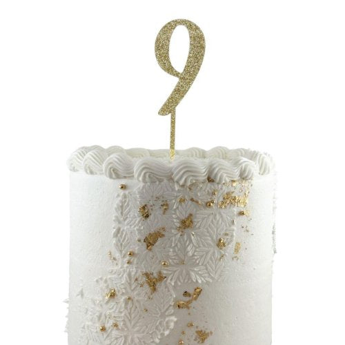 Gold glitter acrylic number 9 cake decoration