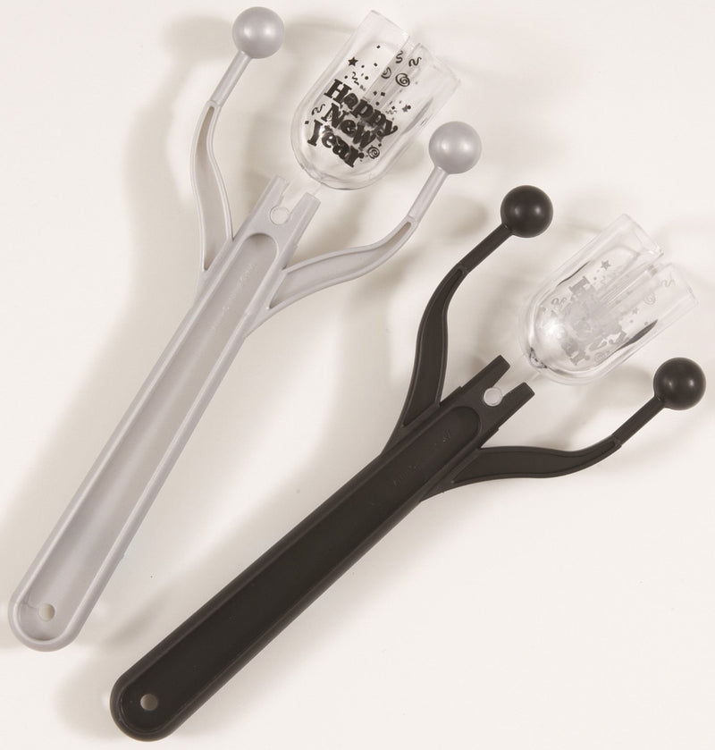 Black and silver New Year party noisemakers