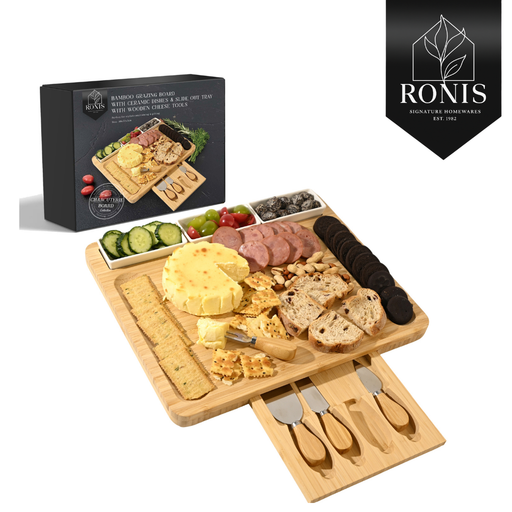 Wooden charcuterie board with food items and cheese knives, accompanied by a RONIS branded box.