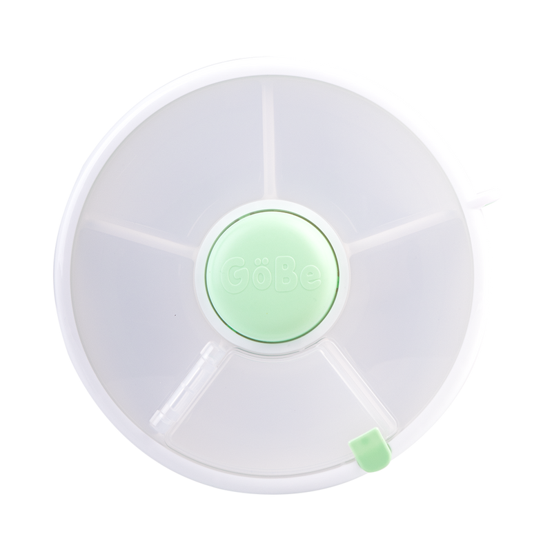 Green rotating snack container for kids