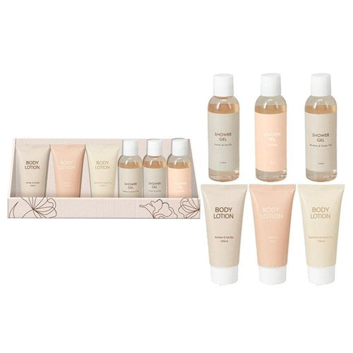Three bottles of assorted fragrance hand and body moisturisers