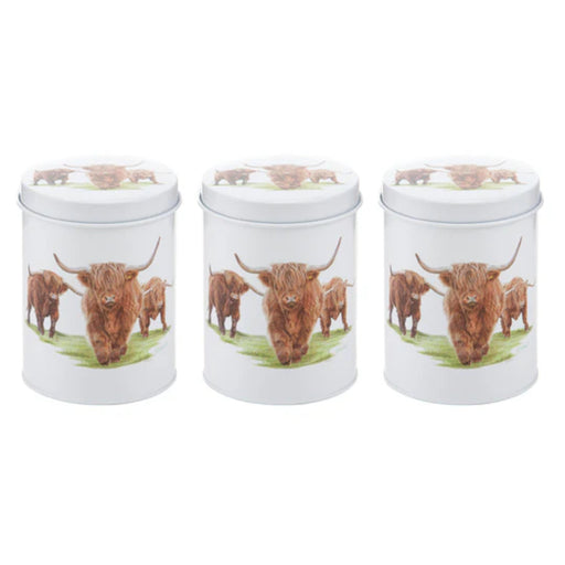 Set of three labeled kitchen canisters with rustic artwork