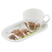 Matching mug and snack plate with Highland herd design