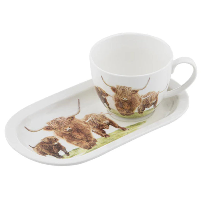 Matching mug and snack plate with Highland herd design