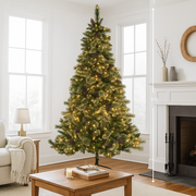 9ft (274cm) Wintery Pine artificial Christmas tree with pre-lit twinkle lights, featuring a realistic green pine look, perfect for a cozy and illuminated holiday display.