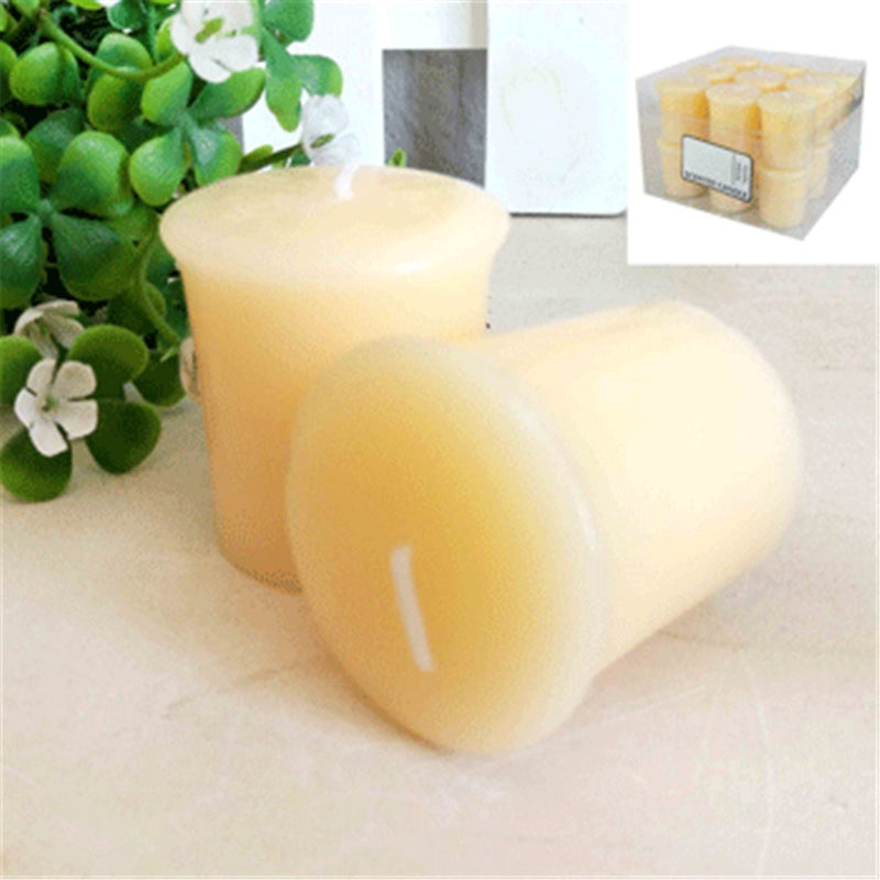 Beige amber vanilla scented votive candle