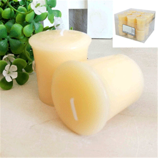 Beige amber vanilla scented votive candle