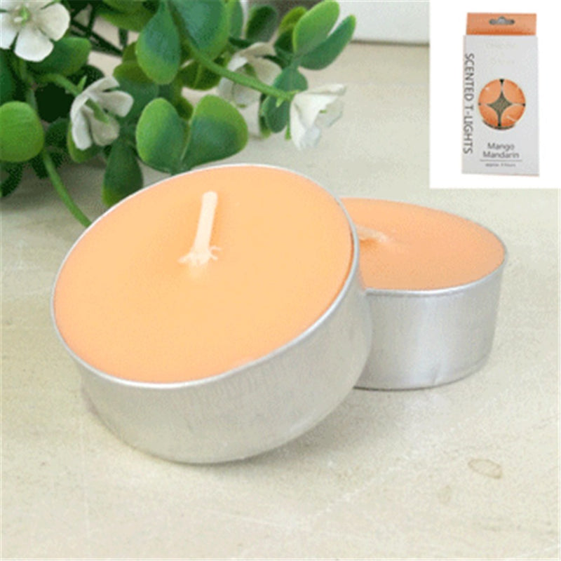 Apricot colored mango mandarin scented tealights