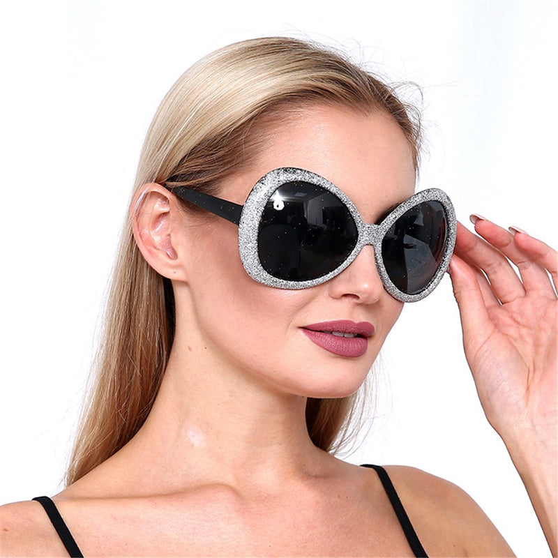Glittering novelty eyewear inspired by classic dance club fashion