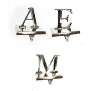 Assorted metal alphabet stocking holder for Christmas mantels