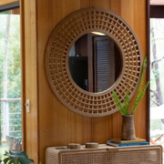 Ava square wall mirror 96.5cm in natural finish hung above a console table – thumbnail