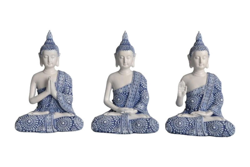 Buddha figurine in blue and white robe