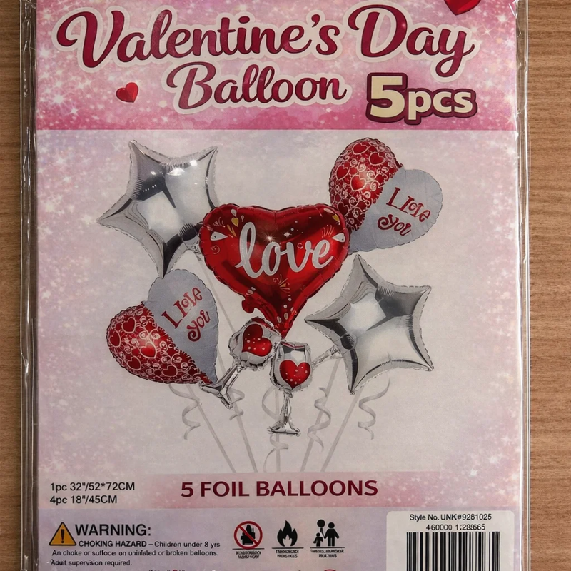 Valentine's Day balloon set packaging with foil balloons on a pink background
