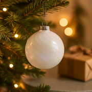 10cm white glass Christmas bauble with faint iridescent stripes