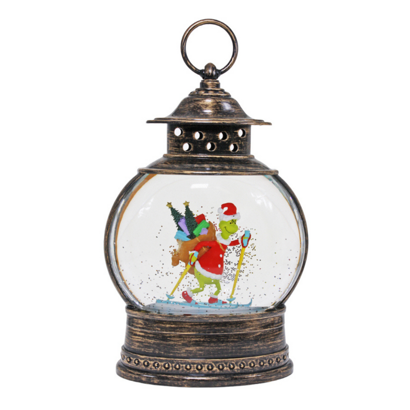 Brass LED lantern with skiing Grinch and water-spinning glitter effect, festive Christmas decoration