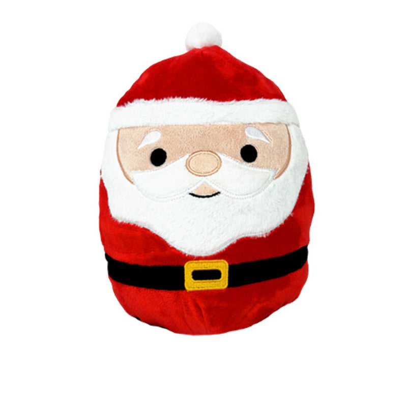 Squishy Santa plush toy posed among festive decorations.