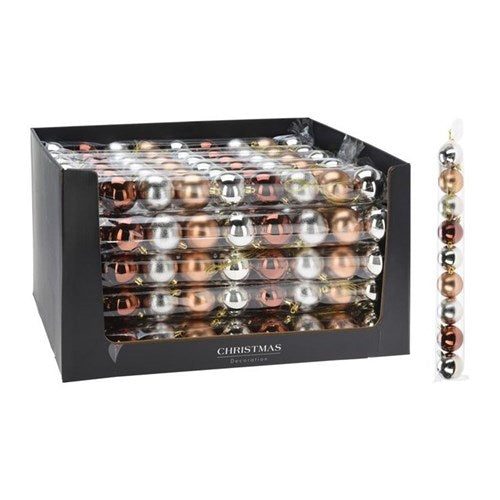 Nine 60 mm amber baubles