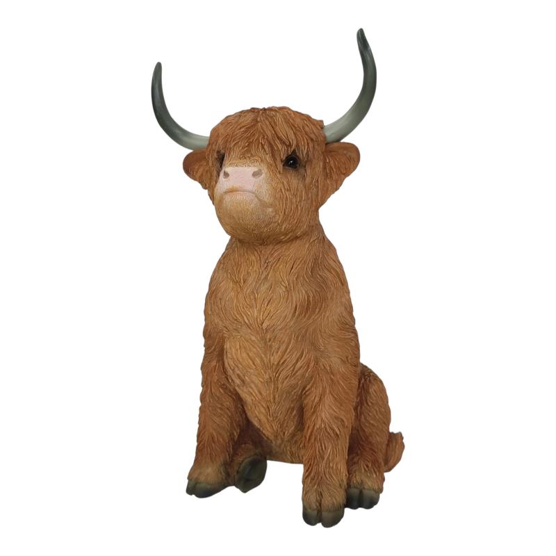 Sitting Highland cow statue 34cm