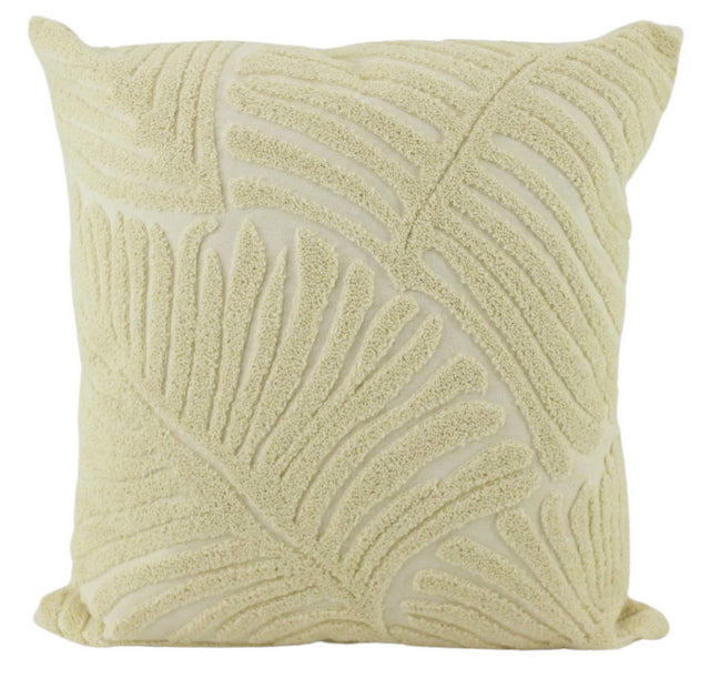 White cushion with leaf pattern