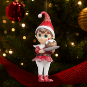 Christmas Elf figurine holding pudding, 11cm tall, festive decoration with holiday outfit and cheerful expression