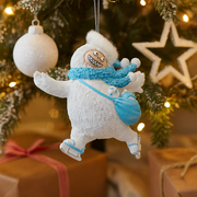 10cm Christmas Yeti figurine skating with joyful pose and winter outfit, perfect holiday decoration