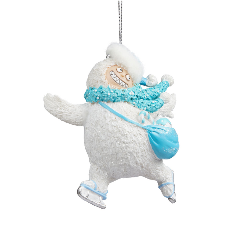 10cm Christmas Yeti figurine skating with joyful pose and winter outfit, perfect holiday decoration