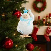 11cm Christmas Yeti figurine holding a candy cane with festive colors and cute details