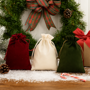 Assorted 2-pack drawstring Christmas gift bags, 13x18cm, in festive designs