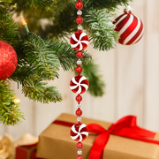 180cm Christmas garland with candycane, lollipop, and bauble decorations in red and white
