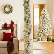 274cm Christmas garland with snow-frosted green pine foliage