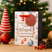 Small embossed Christmas gift bag with festive design and ribbon handles – 11.1x13.7x6.2cm