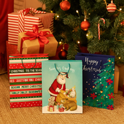 Assorted jumbo Christmas gift bags with festive prints and FSC Mix certified eco-friendly paper