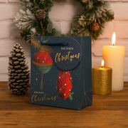 Small Christmas gift bag with festive finial ornament design and sturdy handles