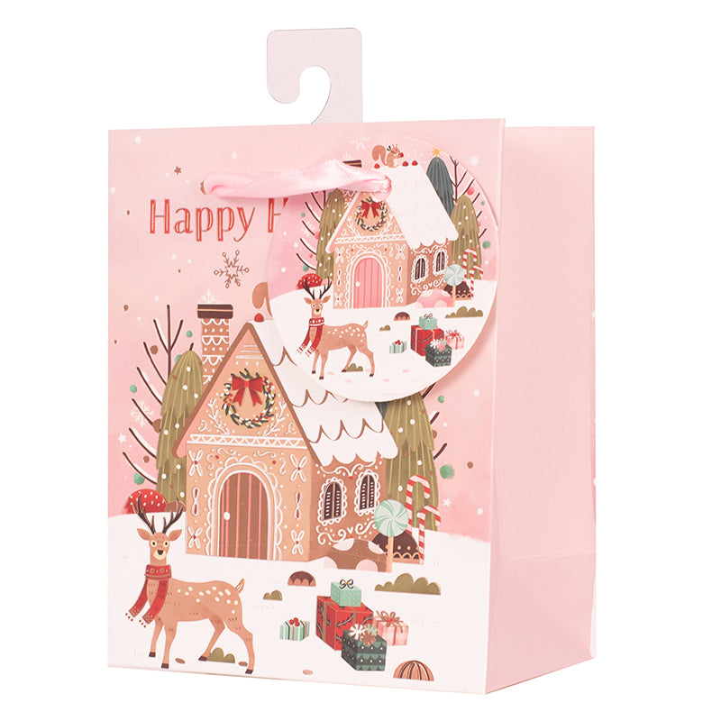 Small Christmas gift bag featuring a festive gingerbread house design, 11.1x13.7x6.2cm