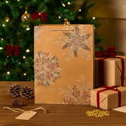 Extra large kraft Christmas gift bag with silver foil snowflake design, size 33x45.7x10.2cm
