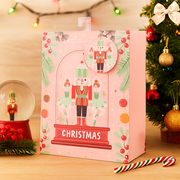 Medium Christmas gift bag with Nutcracker Suite in cloche design, size 18x23x10cm