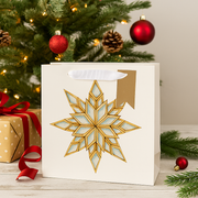 Medium square Christmas gift bag with snowflake design and ribbon handles – 25x10x25cm