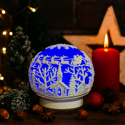Christmas LED waterball with white church and swirling glitter inside illuminated snow globe