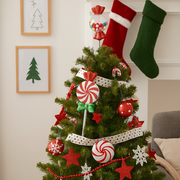 60cm Christmas lolly tree stuffer with bright swirl design in festive colours