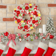 71cm Candyland Christmas wreath with colorful faux candy, baubles, and glitter details – playful and whimsical holiday door decoration