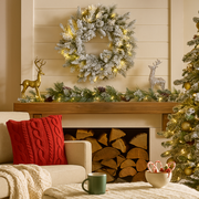 61cm Christmas wreath with snowy green pine foliage