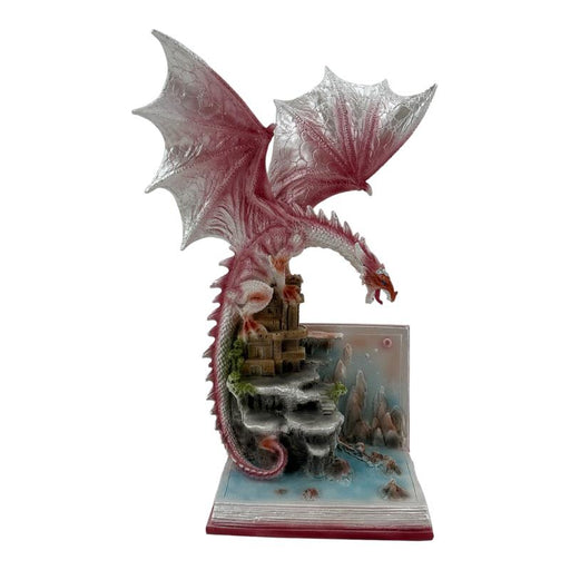 Pink dragon on fairytale book figurine
