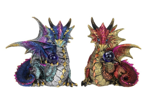 Red and blue dragon holding orb figurine